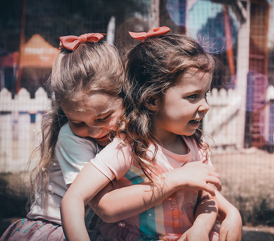 sisters hugging